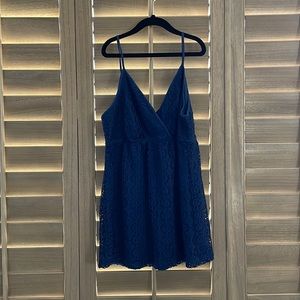 Navy blue tank with lace overlay.